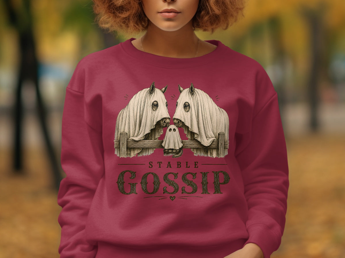 Crewneck sweatshirt with "Stable Gossip" text and horses in ghost costumes.