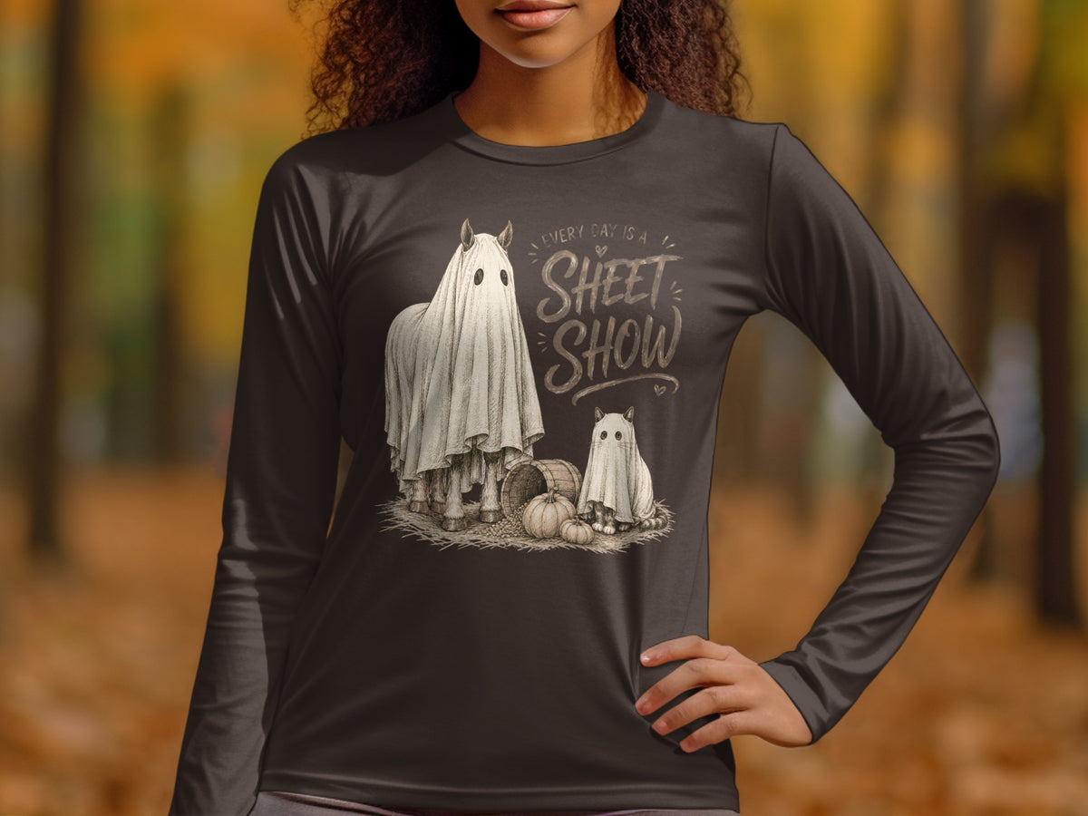 Dark long sleeve shirt with "Every Day is a Sheet Show" text and horse and cat dressed as ghosts.