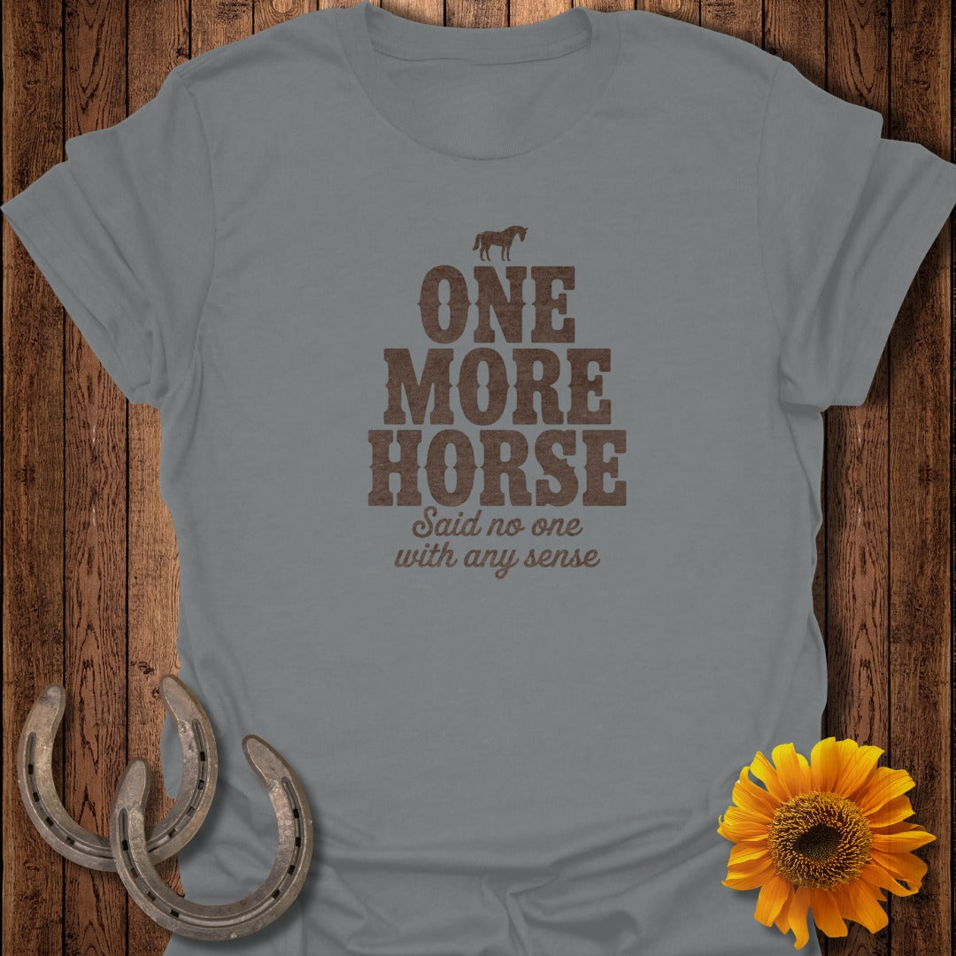 Grey t-shirt with brown text "ONE MORE HORSE" and a small horse graphic.