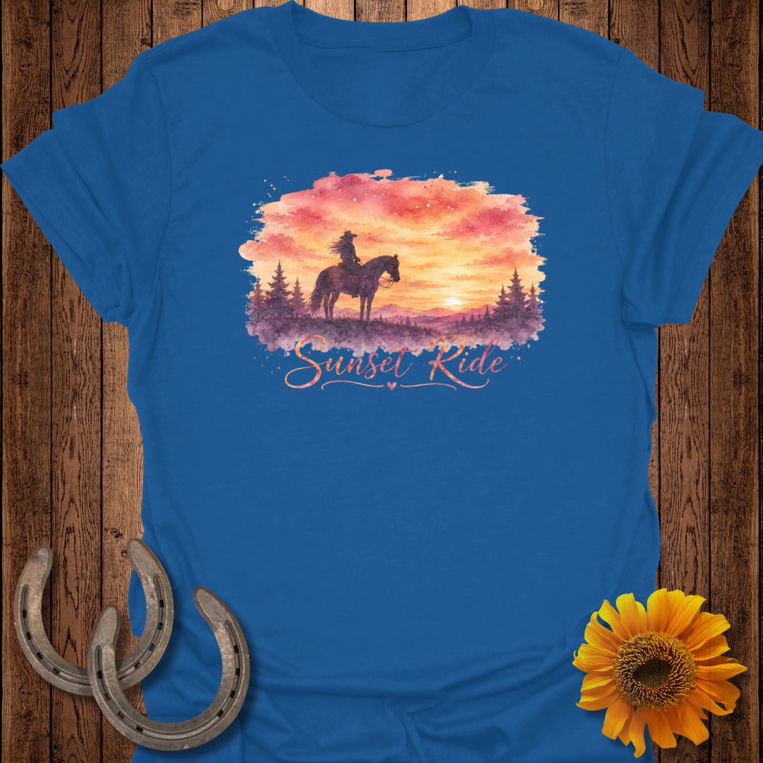 Blue t-shirt with sunset horse rider graphic and "Sunset Ride" text.