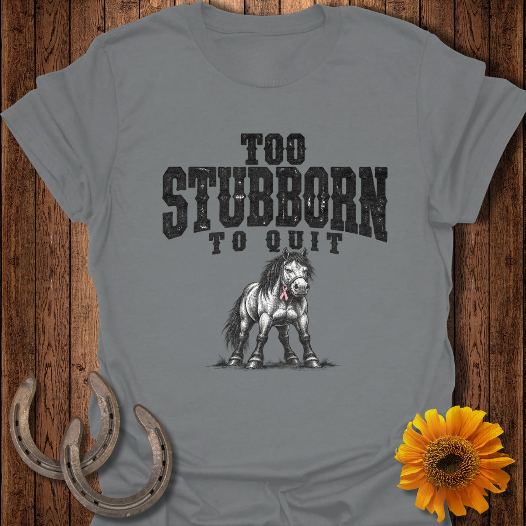Grey t-shirt with distressed text "TOO STUBBORN TO QUIT" and a horse graphic.