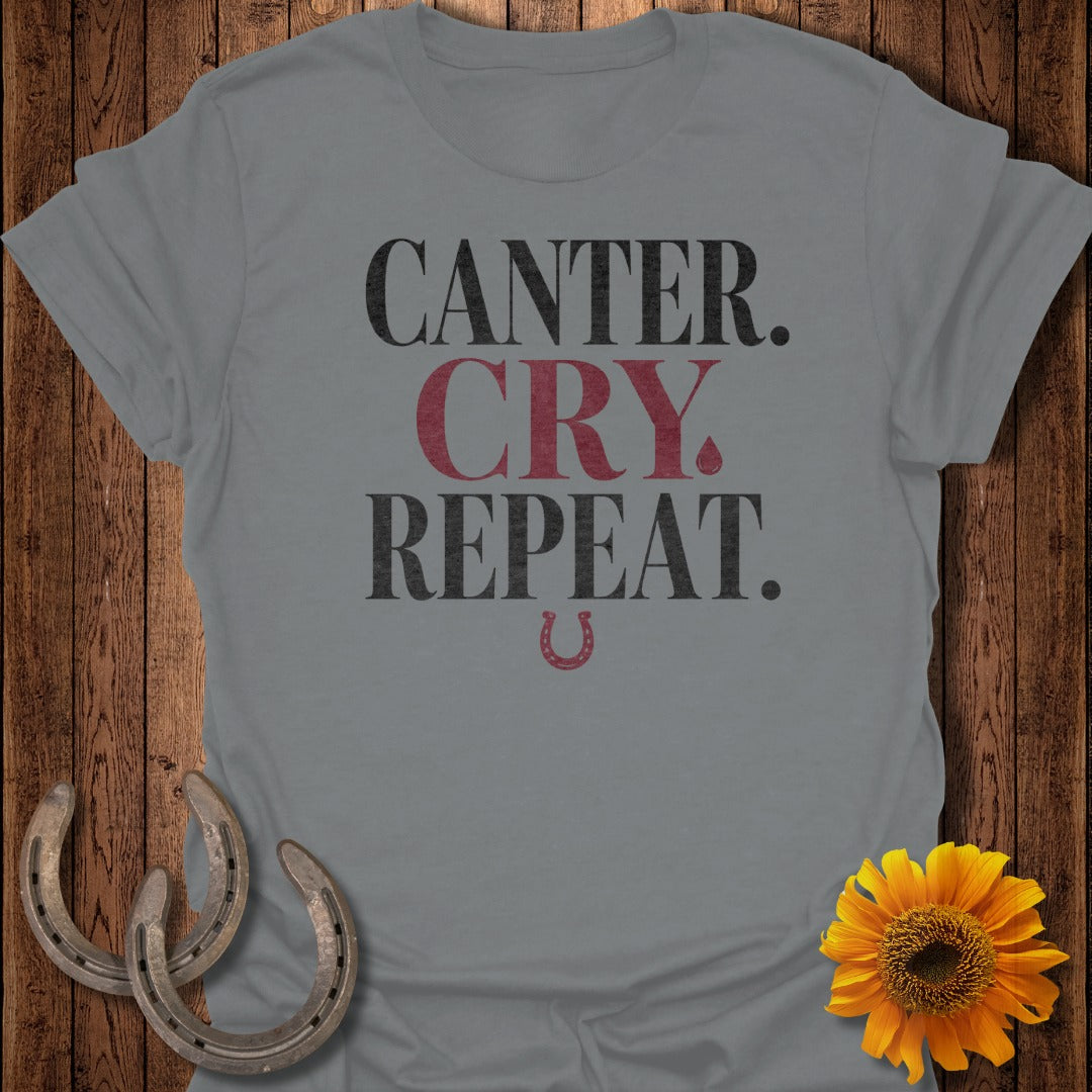 Grey t-shirt with "Canter. Cry. Repeat." text and horseshoe graphic.