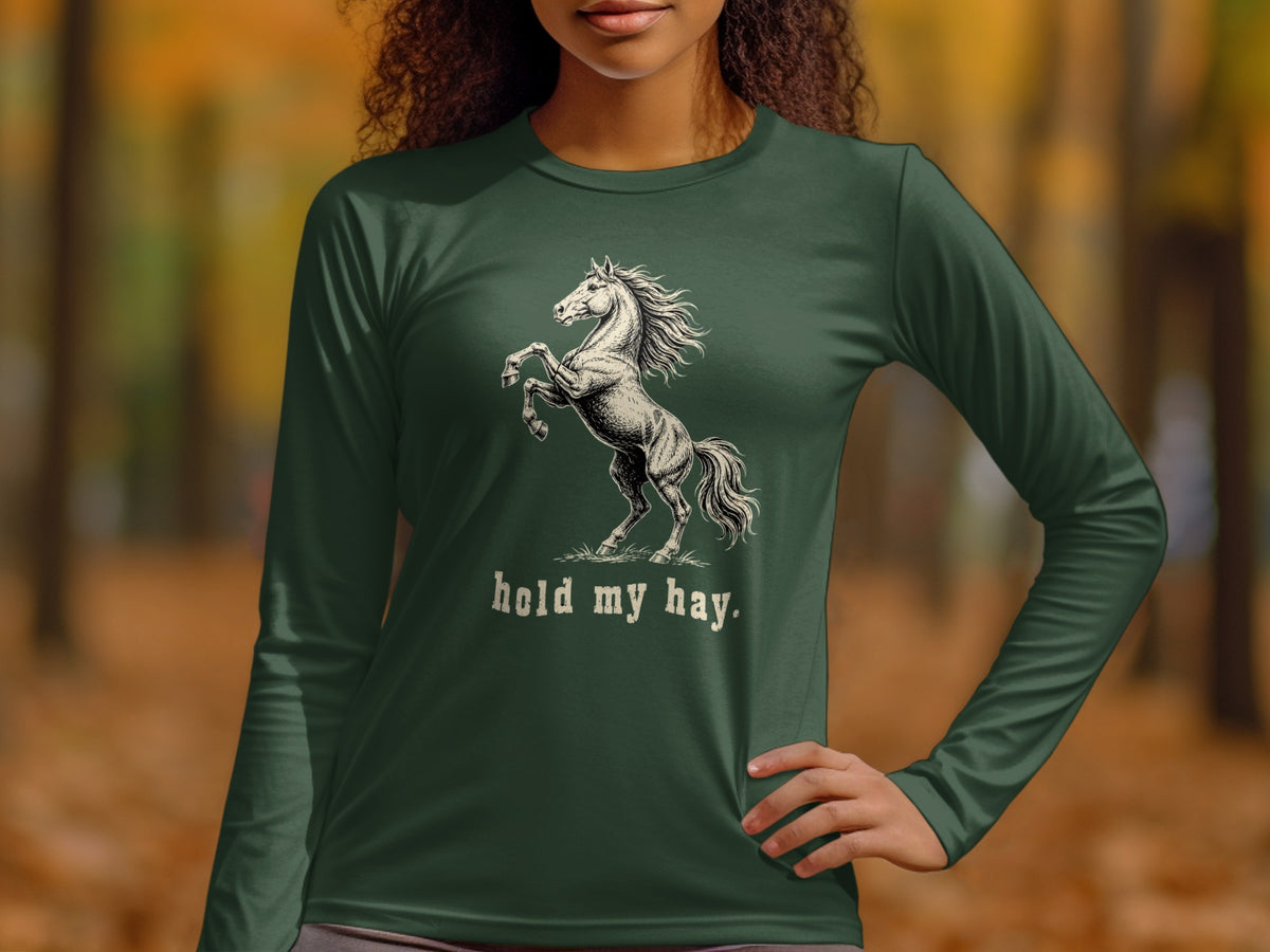 Dark green long-sleeve shirt with rearing horse graphic and "hold my hay." text.