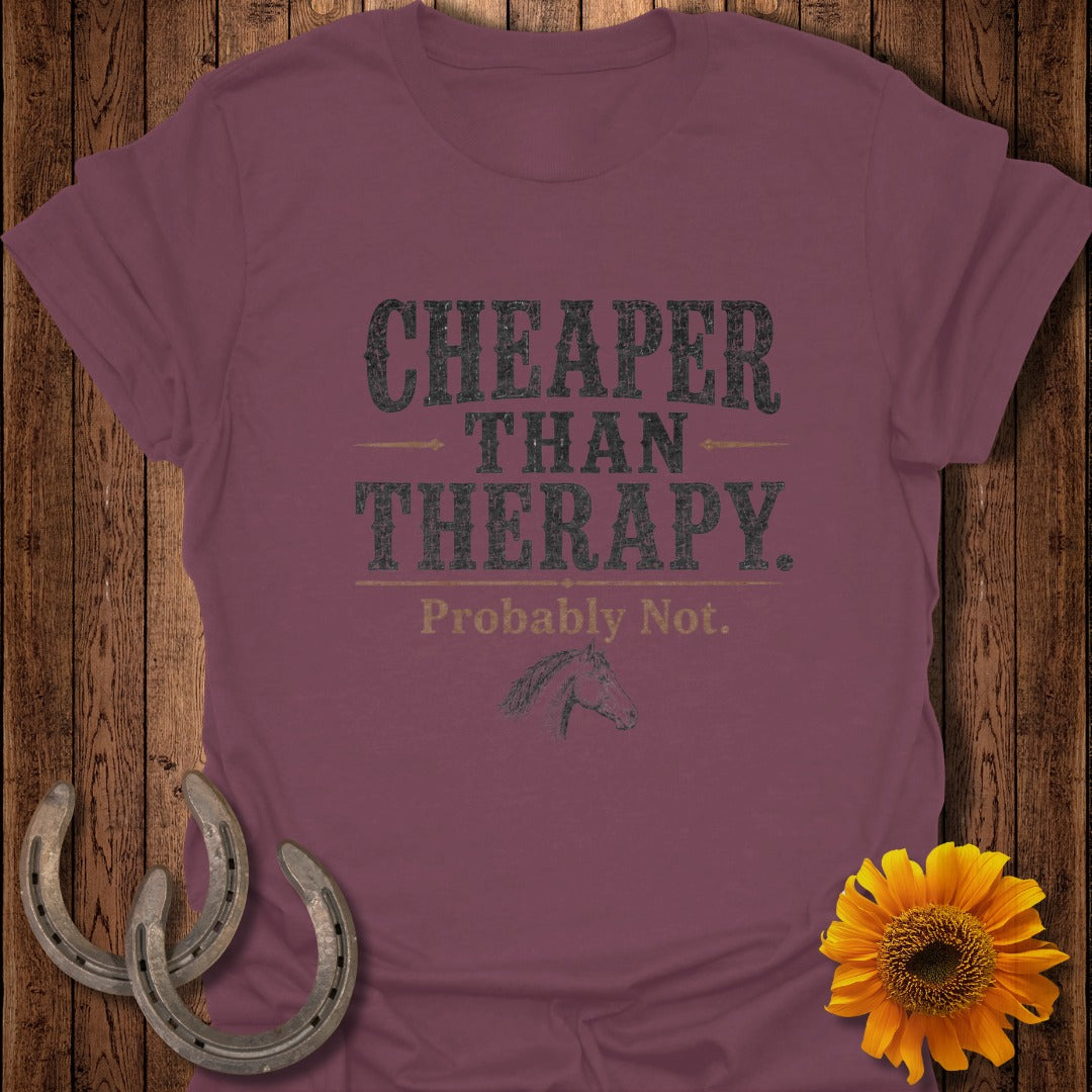 Maroon t-shirt with "Cheaper Than Therapy. Probably Not." text and horse graphic.