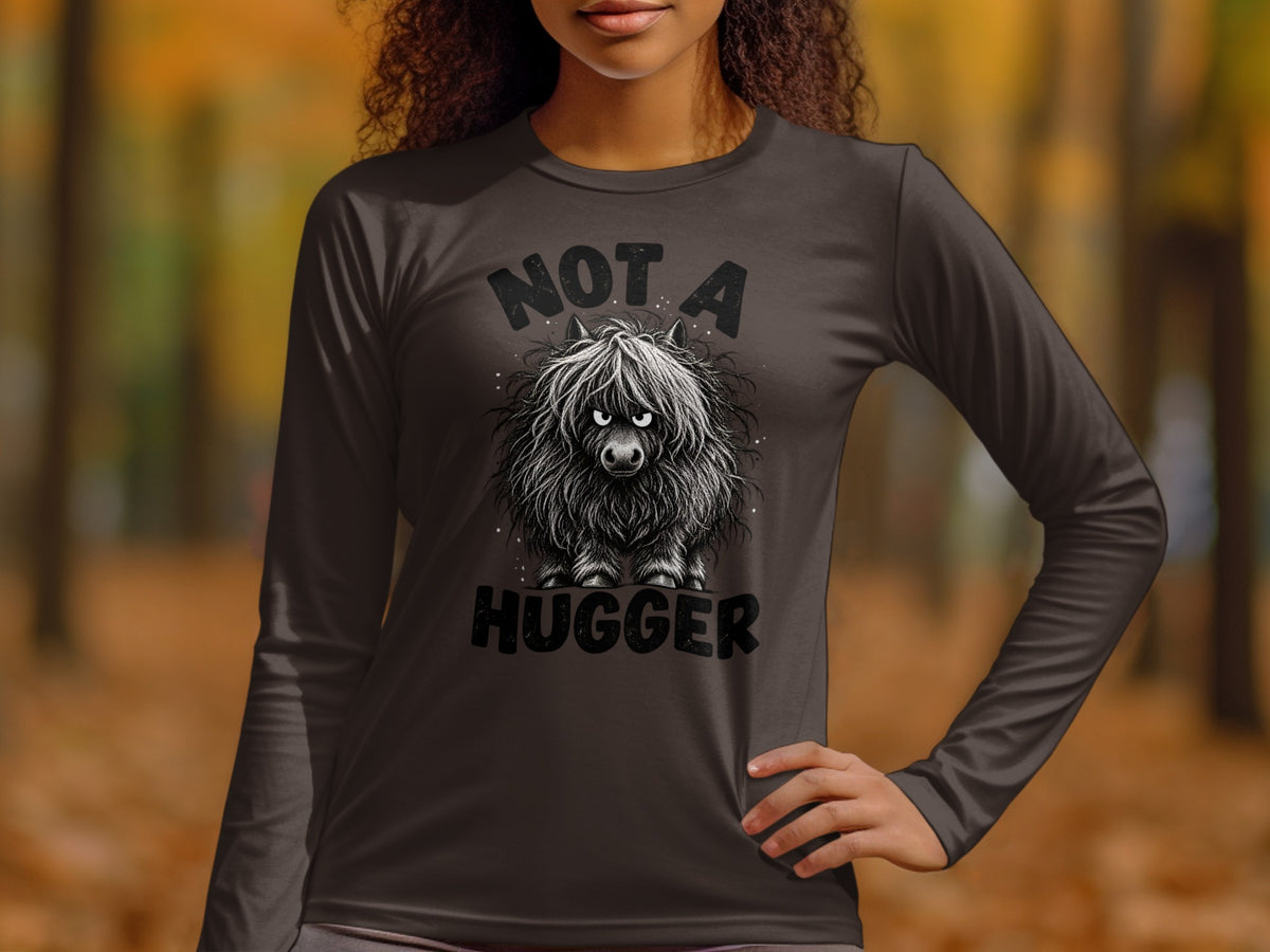 Long sleeve shirt with a hairy creature and text "NOT A HUGGER".