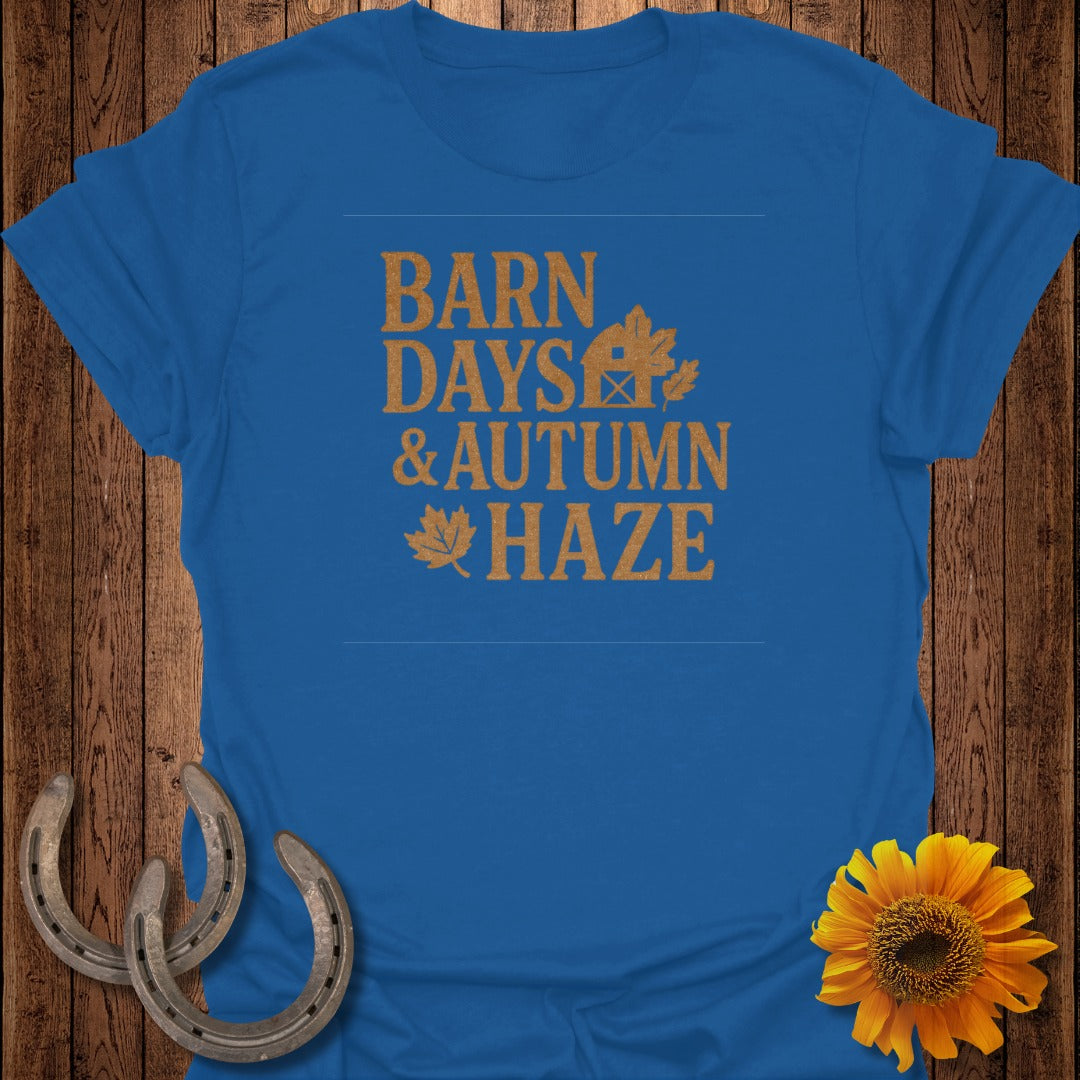Blue t-shirt with "BARN DAYS & AUTUMN HAZE" text and autumn leaf graphics.