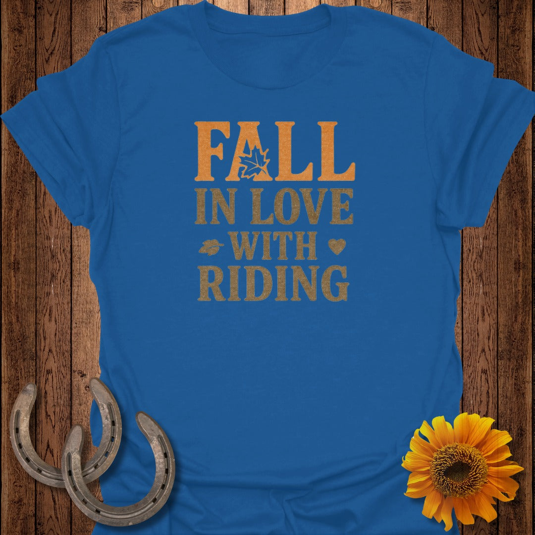 Blue t-shirt with "FALL IN LOVE WITH RIDING" text and fall accents.