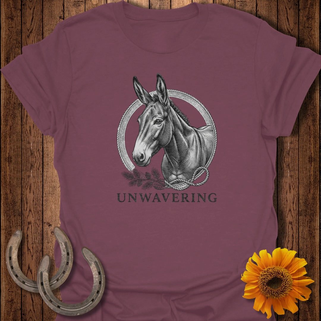 Mule head illustration within rope circle, "UNWAVERING" text below, on burgundy t-shirt.