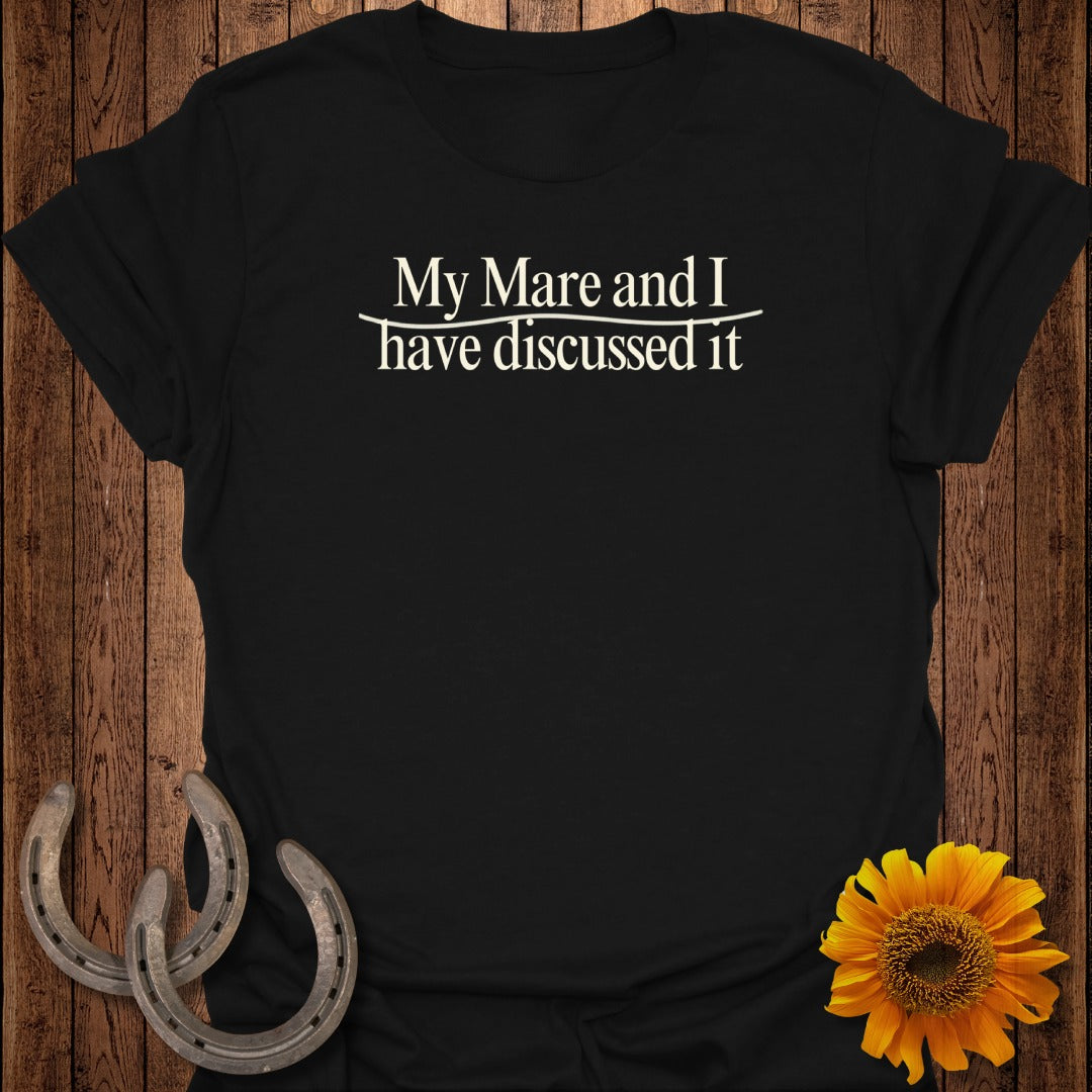 Black t-shirt with white text "My Mare and I have discussed it" and horseshoe accents.