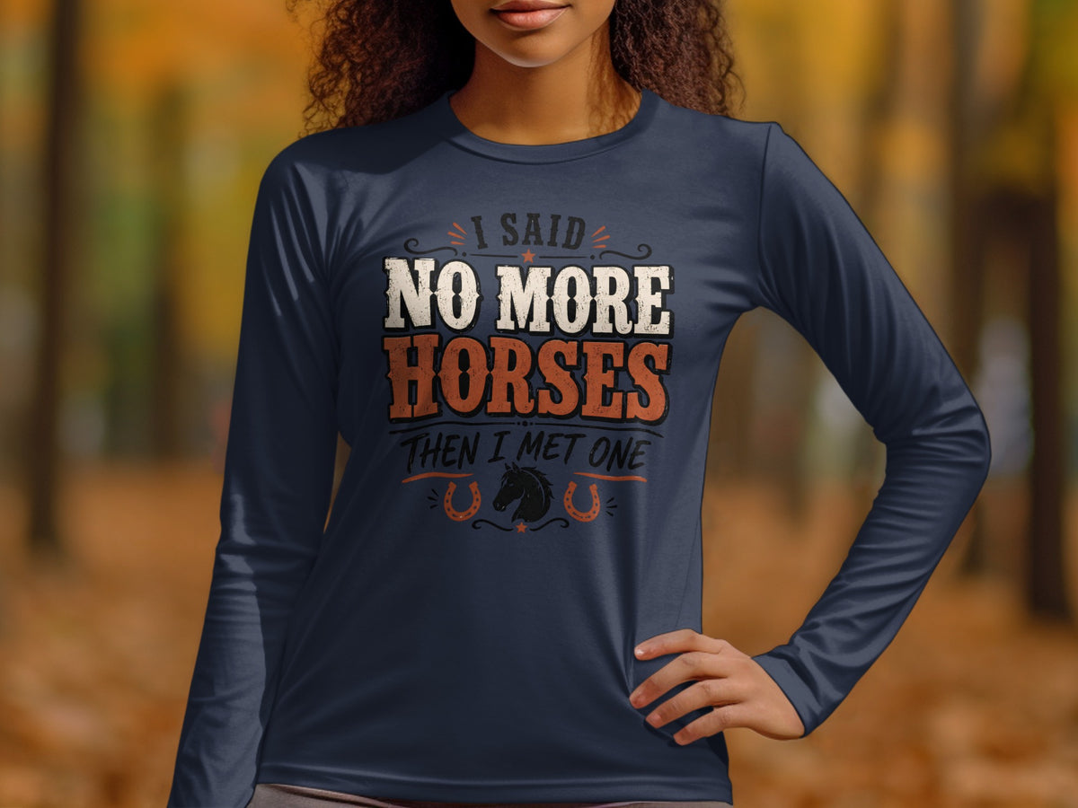 Navy long-sleeve shirt with text: "I SAID NO MORE HORSES THEN I MET ONE".