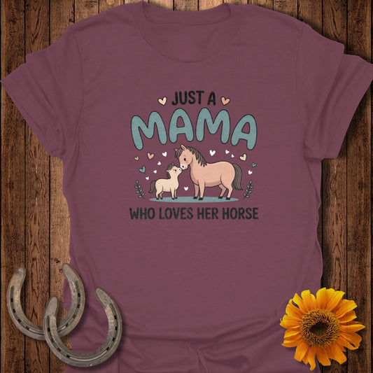 Maternity t-shirt with pink horse and foal graphic, reading "Just a Mama Who Loves Her Horse".