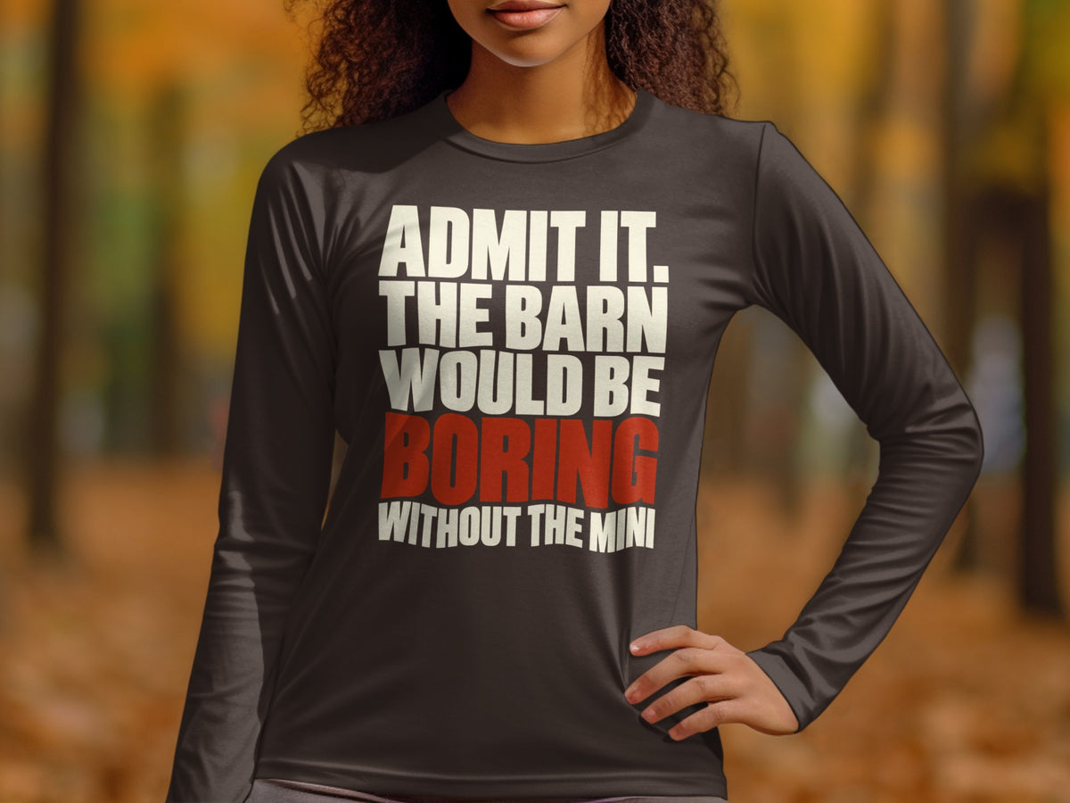 A person wearing a dark grey long-sleeve shirt with the text ADMIT IT. THE BARN WOULD BE BORING WITHOUT THE MINI.