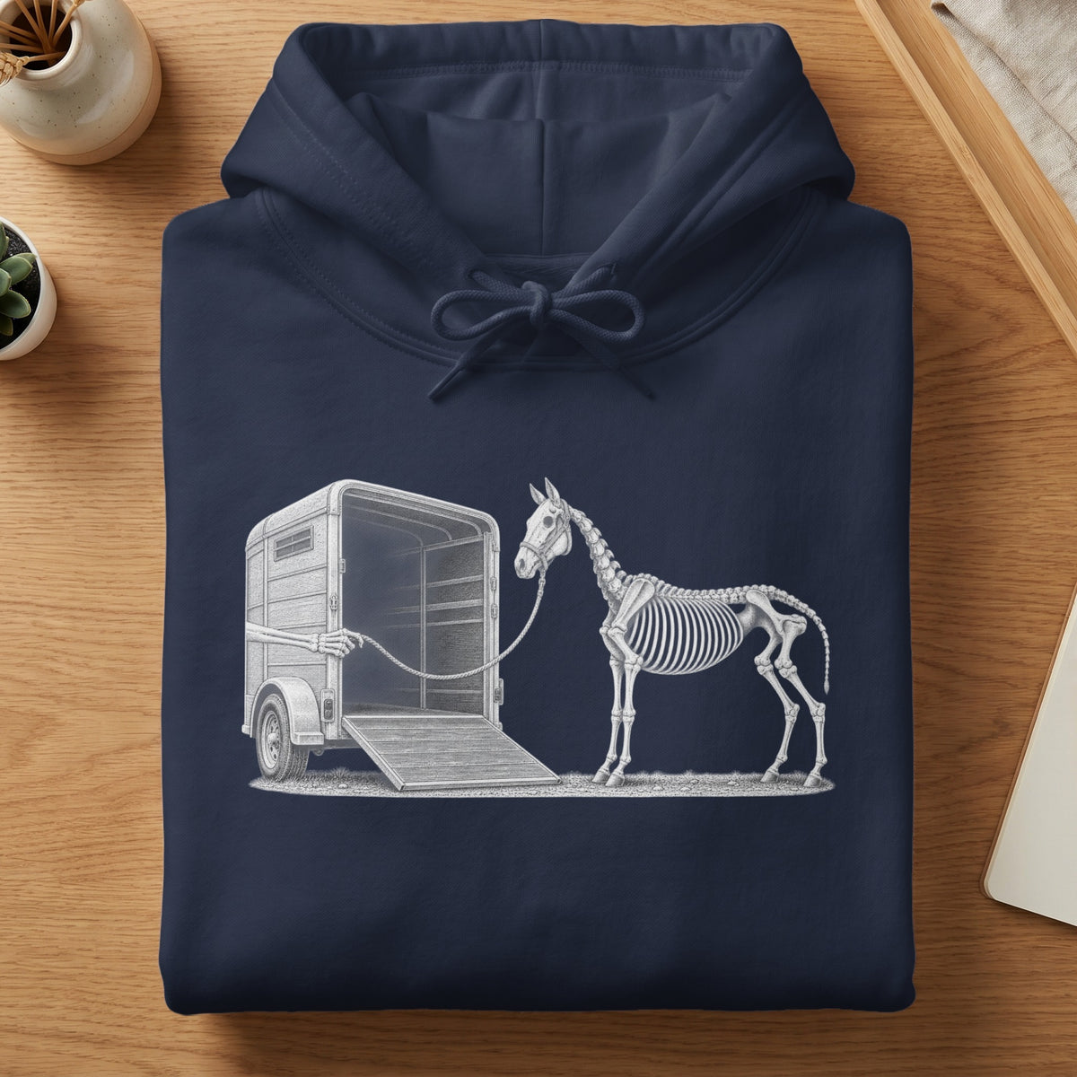 Skeleton horse being led into a trailer by a skeleton hand.