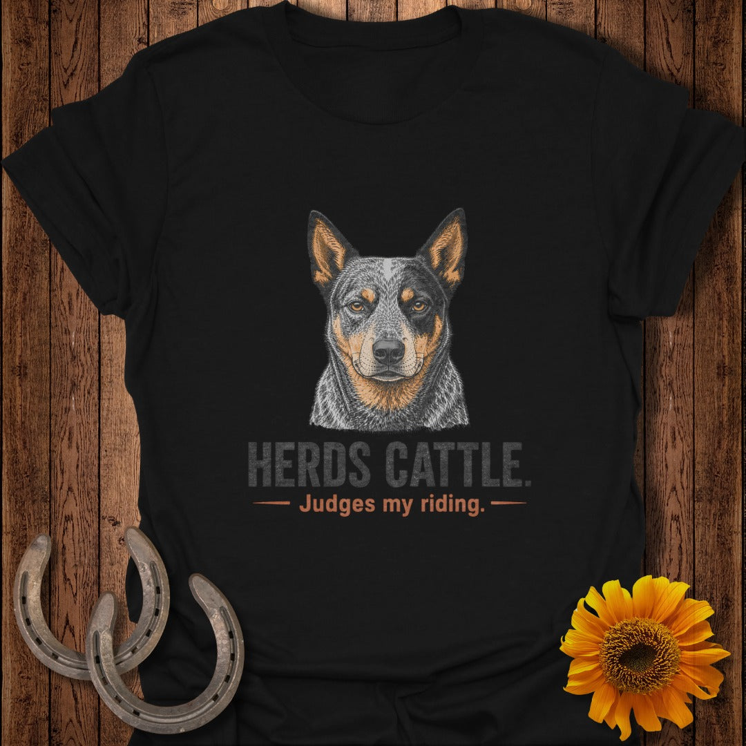 Black t-shirt with Australian Cattle Dog illustration and text "Herds Cattle. Judges my riding."