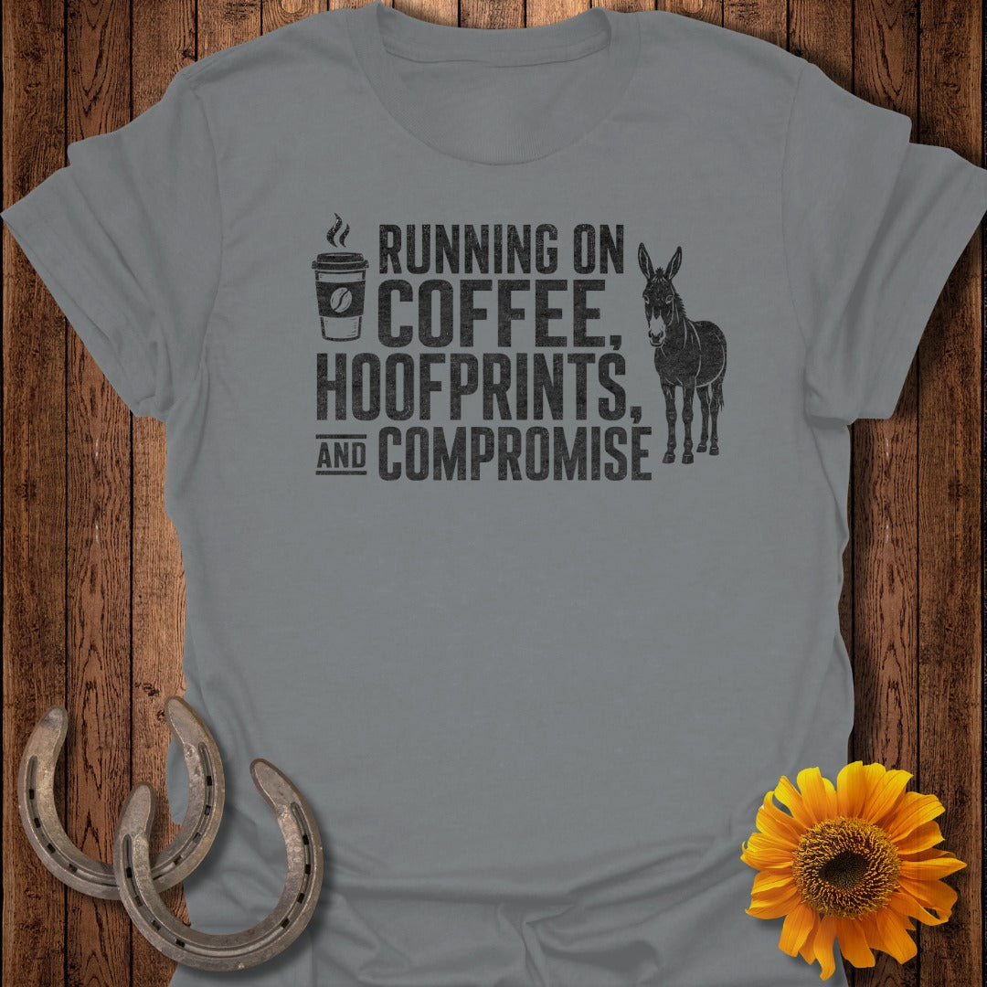 Gray t-shirt with text "RUNNING ON COFFEE, HOOFPRINTS, AND COMPROMISE" and a donkey.