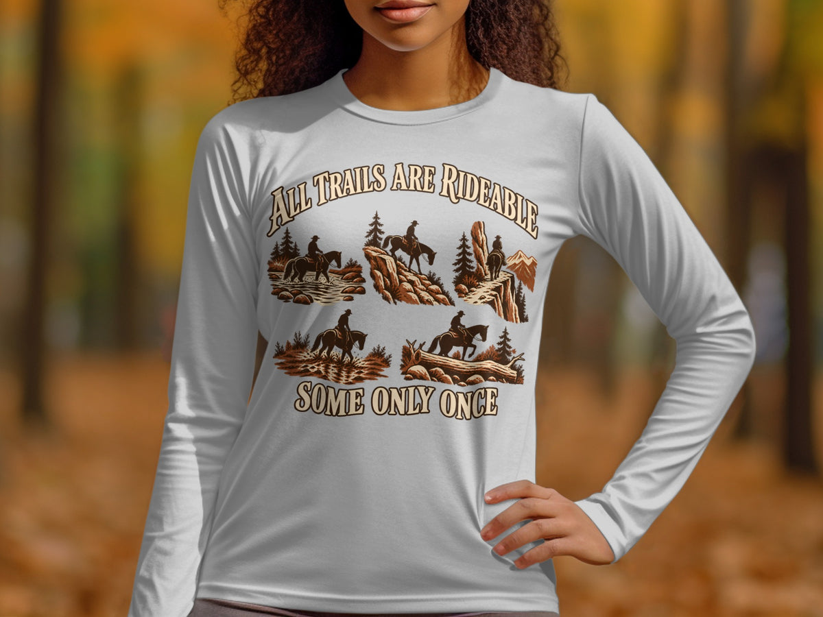 White long-sleeve shirt with "All Trails Are Rideable, Some Only Once" and horse riding scenes.