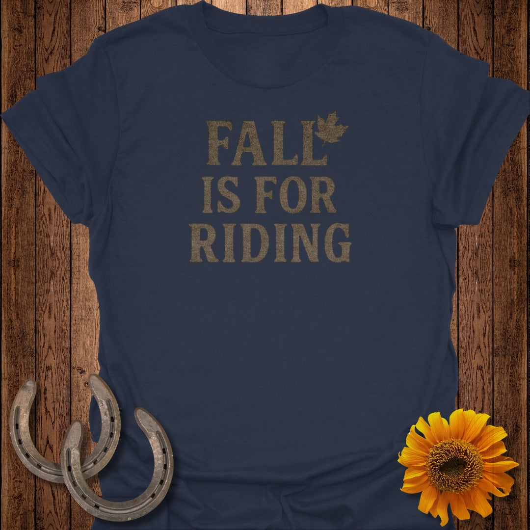 Navy t-shirt with "FALL IS FOR RIDING" text and a small maple leaf.