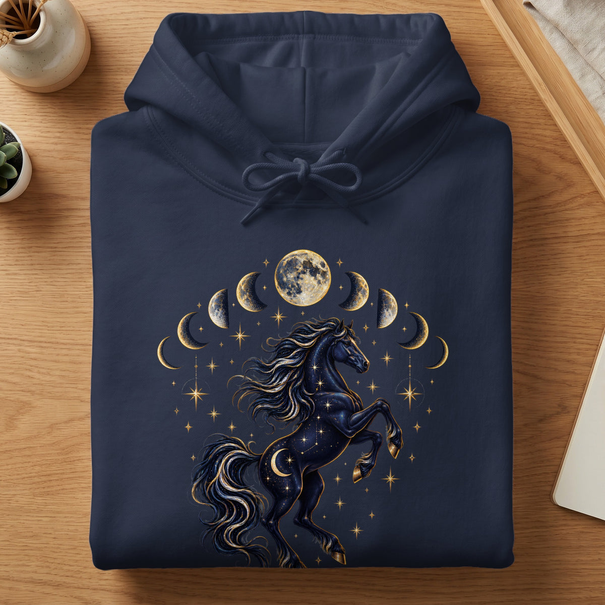 Navy blue hoodie with a black horse, moon phases, and stars graphic.