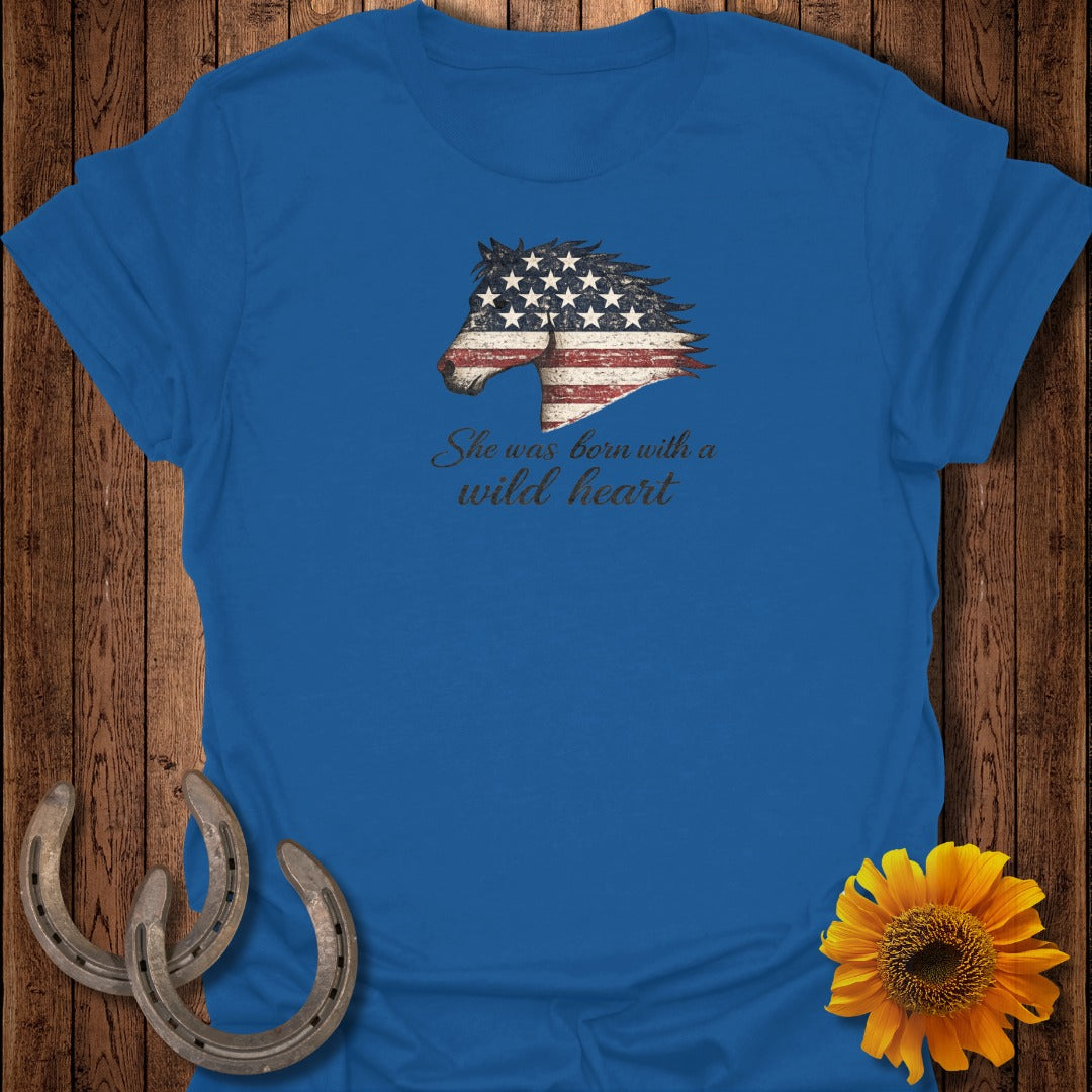 Blue t-shirt with American flag horse graphic and text "She was born with a wild heart".