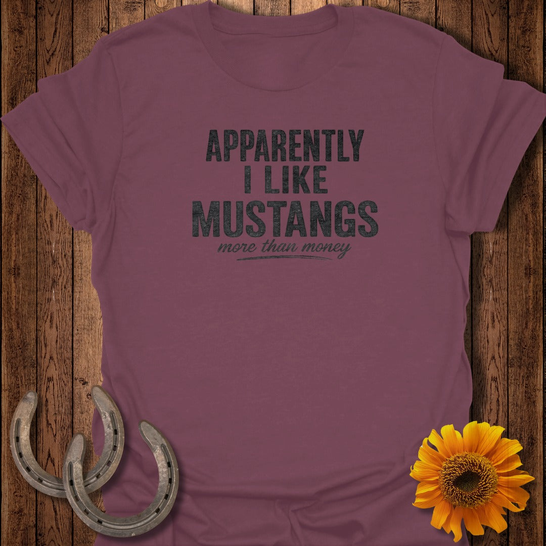 Maroon t-shirt with "Apparently I Like Mustangs More Than Money" text.
