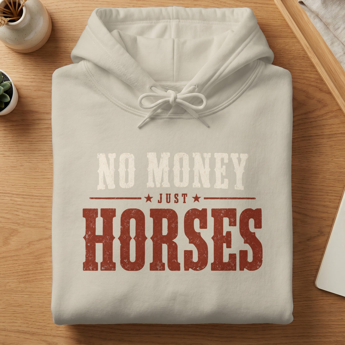Cream hoodie with "NO MONEY JUST HORSES" text in distressed red and cream.