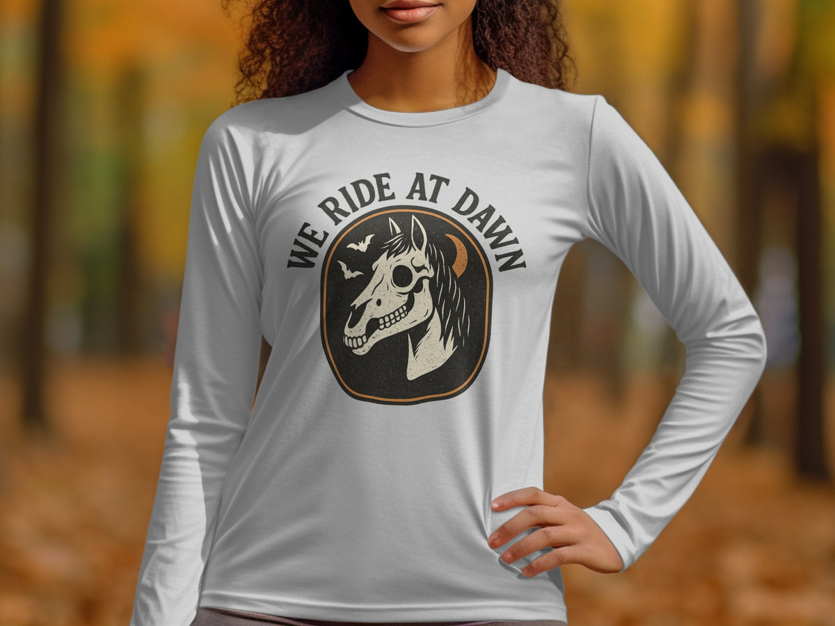 White long-sleeve shirt with a distressed graphic of a horse skull and bats.