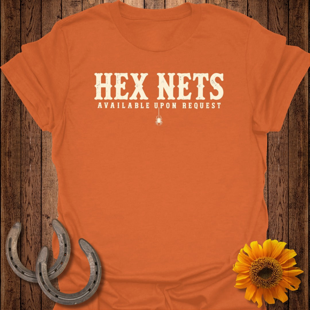 Orange t-shirt with "HEX NETS AVAILABLE UPON REQUEST" and spider graphic.