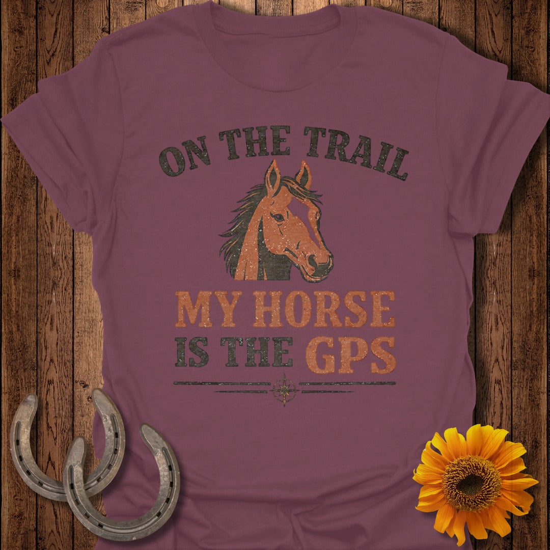Maroon t-shirt with horse graphic and text "ON THE TRAIL MY HORSE IS THE GPS".