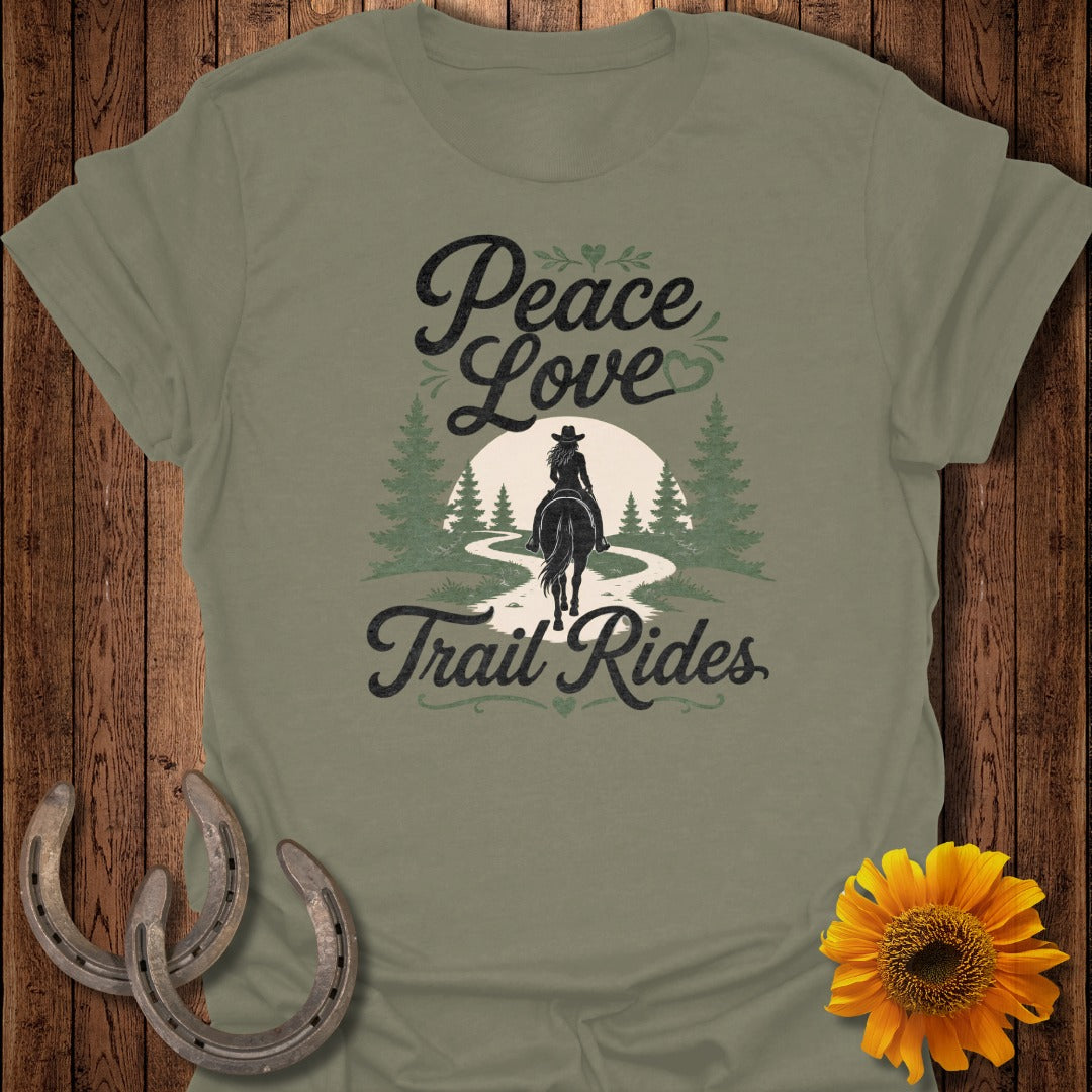 Olive green t-shirt with "Peace Love Trail Rides" graphic of a rider on a horse.