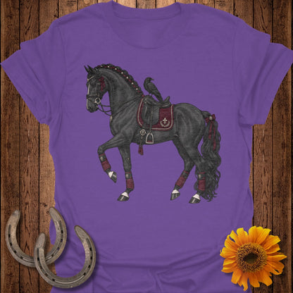 Black horse with ornate tack and raven on purple t-shirt.