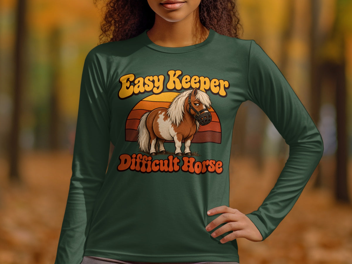 Green long-sleeve shirt with "Easy Keeper Difficult Horse" text and a pony illustration.