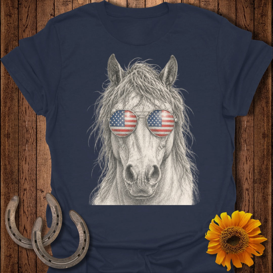 Horse wearing American flag sunglasses on navy blue t-shirt.