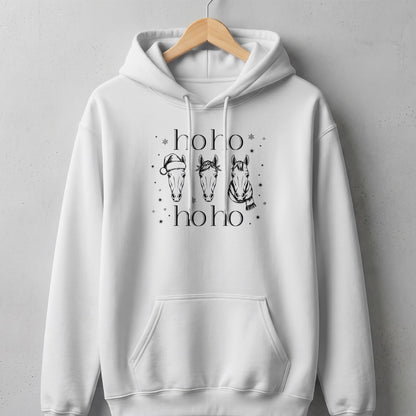 White hoodie with three horses wearing holiday accessories and "hoho hoho" text.