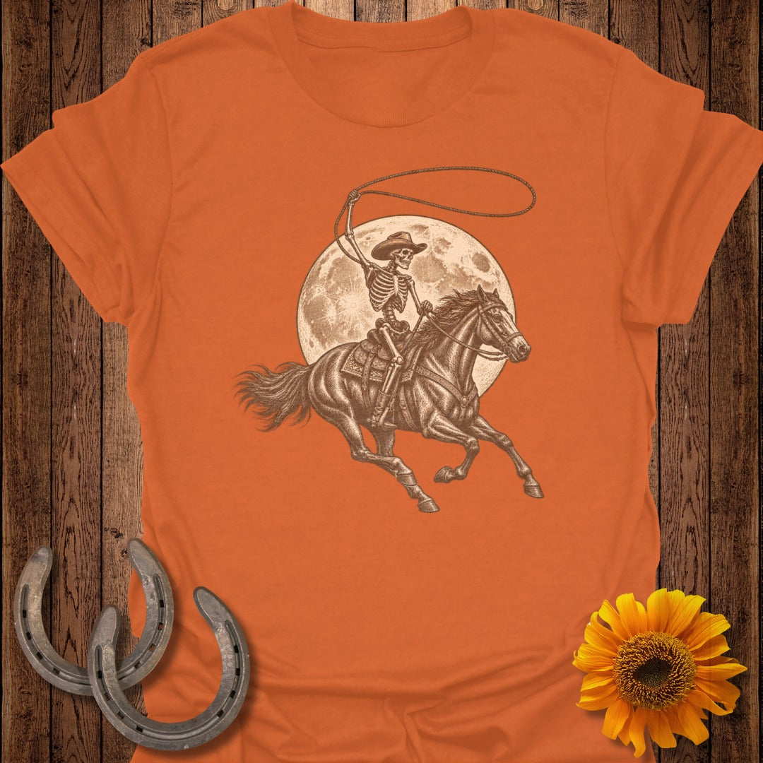 Skeleton cowboy on horseback with lasso and full moon background.