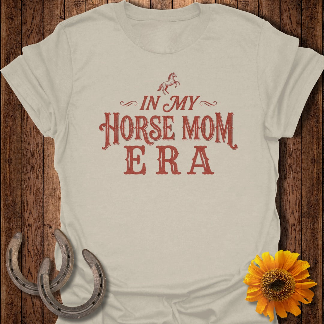 Light beige t-shirt with red text "In My Horse Mom Era" and horse silhouette.