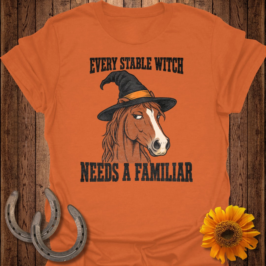 Horse wearing a witch hat with text "Every Stable Witch Needs a Familiar."