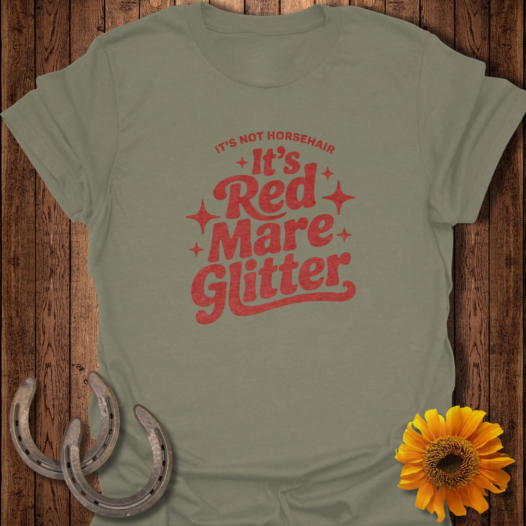 Olive green t-shirt with red text that reads "It's Red Mare Glitter."