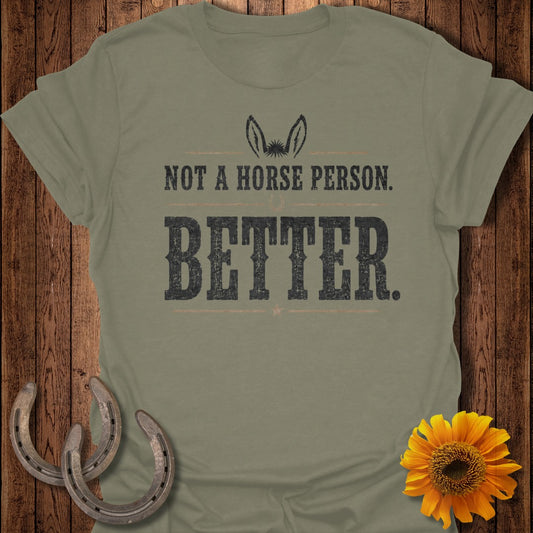 Olive t-shirt with "Not a horse person. Donkey better." text and donkey ears.