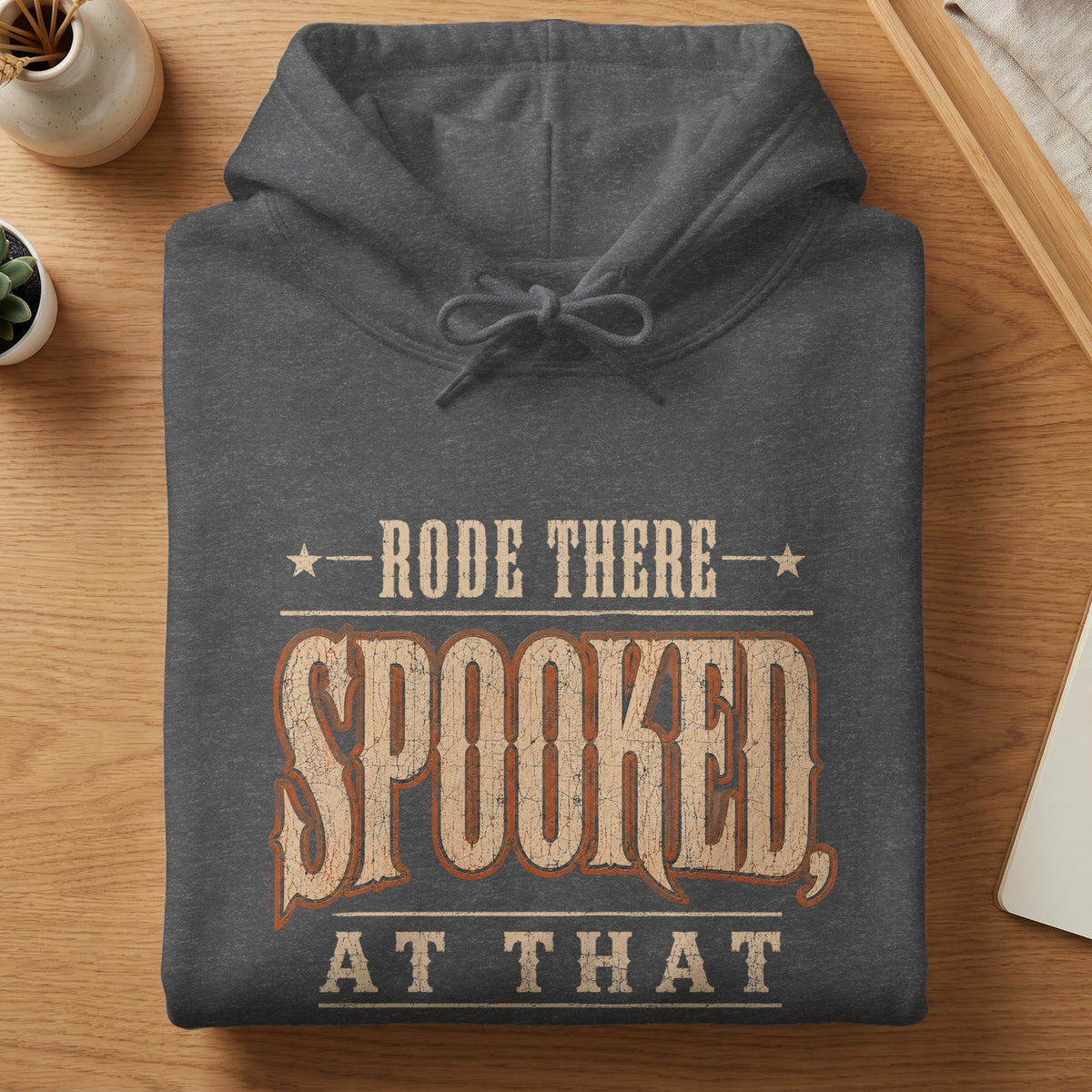 Dark gray hoodie with distressed text: "Rode There, Spooked, At That"