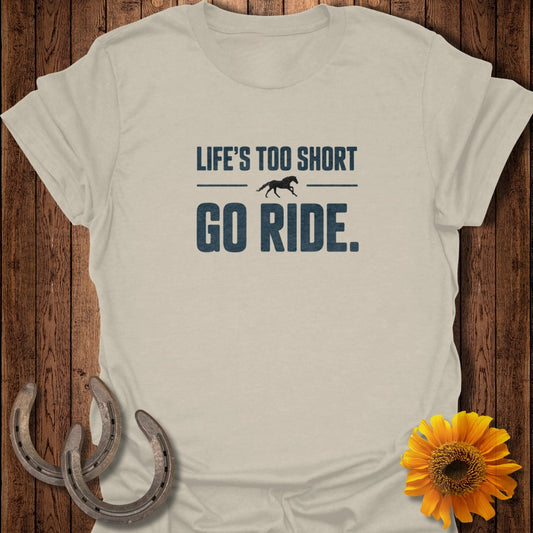 Light beige t-shirt with "LIFE'S TOO SHORT GO RIDE." and a horse graphic.