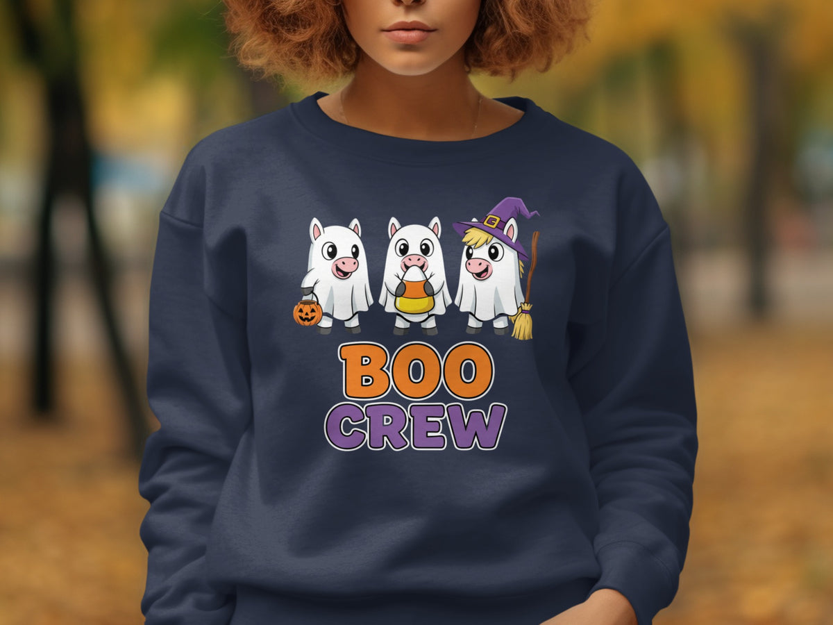 Three cartoon ghosts with Halloween accessories and "BOO CREW" text.
