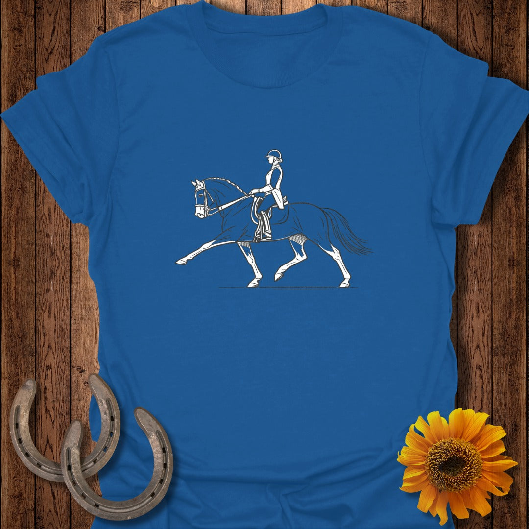 Blue t-shirt with a white line drawing of a dressage rider on a horse.