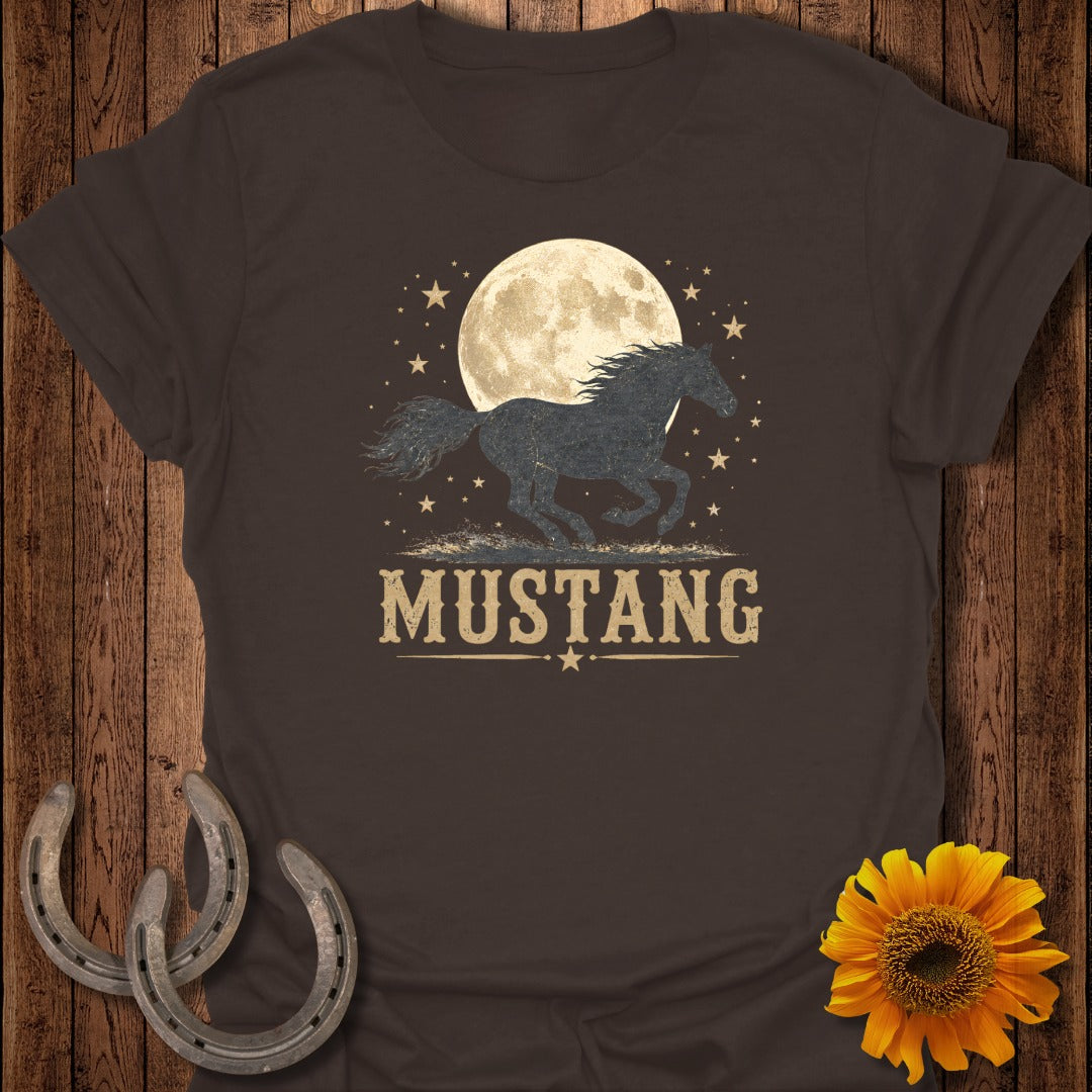 Brown t-shirt with a silhouette of a mustang running under a full moon and stars.