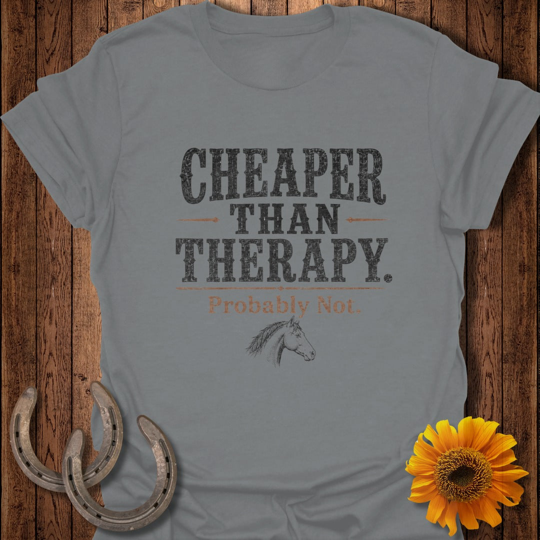 Grey t-shirt with "Cheaper Than Therapy. Probably Not." text and horse graphic.