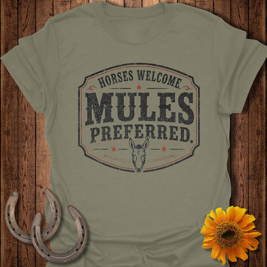 Green t-shirt with "Horses Welcome, Mules Preferred" graphics and mule illustration.