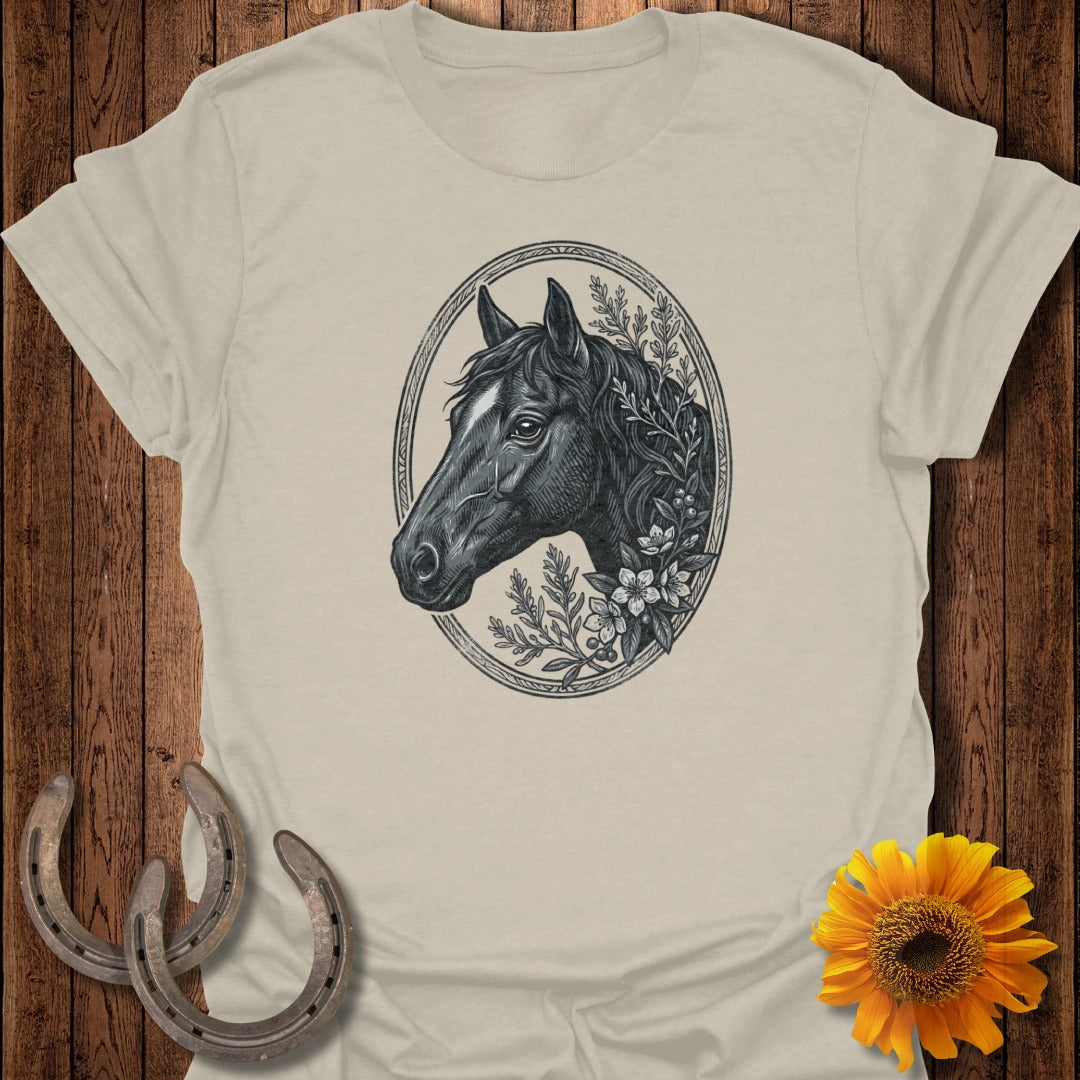 Illustration of a horse's head within an oval frame, surrounded by flowers.