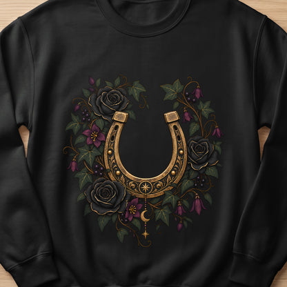 Black sweatshirt with a golden horseshoe surrounded by black roses and purple flowers.