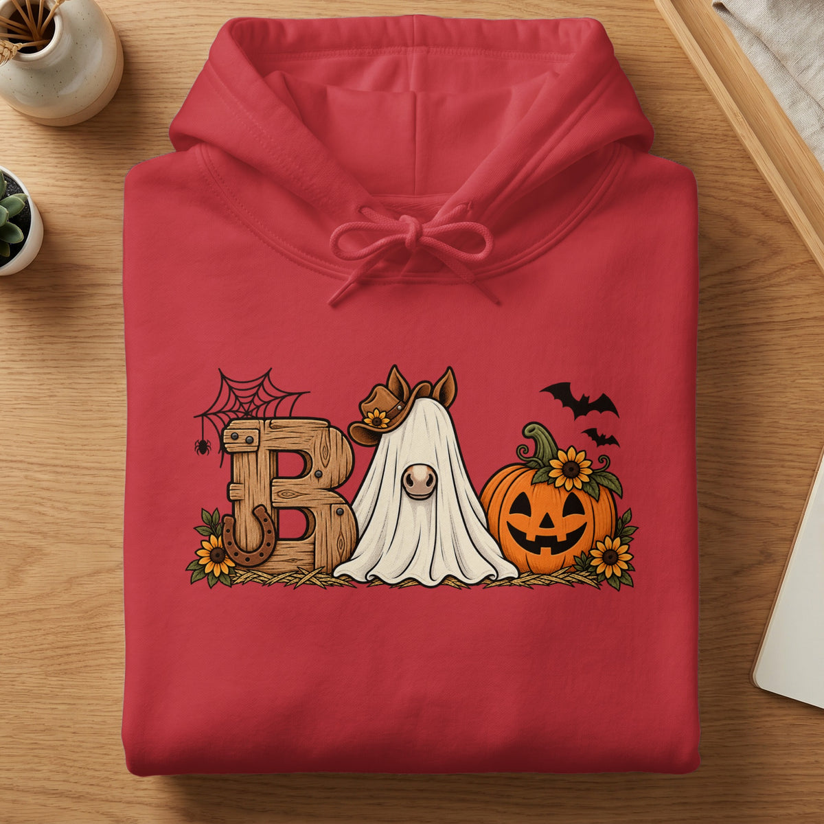 Red hoodie with a Halloween graphic of a horse ghost, jack-o-lantern, and "BOO" text.