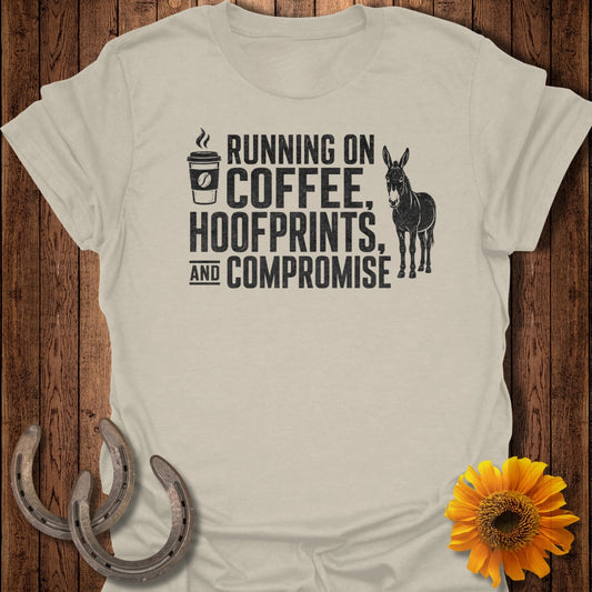 T-shirt with text "Running on coffee, hoofprints, and compromise" and a donkey graphic.