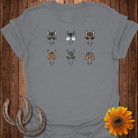 Six horses with Halloween-themed sunglasses and decorations on a gray t-shirt.